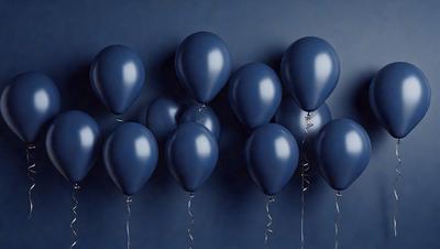 The primary subject of the image is a group of blue balloons. They are hanging on a wall, creating a visually appealing display. The setting is a blue wall, which serves as the backdrop for the balloons. The visual style of the image is a photo, capturing the details of the balloons and their arrangement. The colors and mood of the image are predominantly blue, giving it a calm and serene atmosphere.