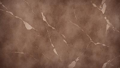 The primary subject of the image is a brown marble wall with a patterned texture. The setting is a room with a brown marble wall as the main focus. The visual style is a close-up of the marble wall, showcasing its unique texture and pattern. The colors and mood of the image are warm and earthy, with the brown marble wall serving as the main point of interest.