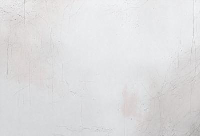 The primary subject of the image is a white wall with a few spots of red paint on it. The setting is a room with a white wall, and the visual style appears to be a photo. The colors and mood of the image are predominantly white and red, creating a contrasting and visually striking scene.