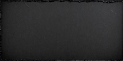 The primary subject of the image is a black background with a white border. The setting is a black cloth, and the visual style is a black and white photo. The colors and mood of the image are predominantly dark and moody, with the black background and white border creating a stark contrast.