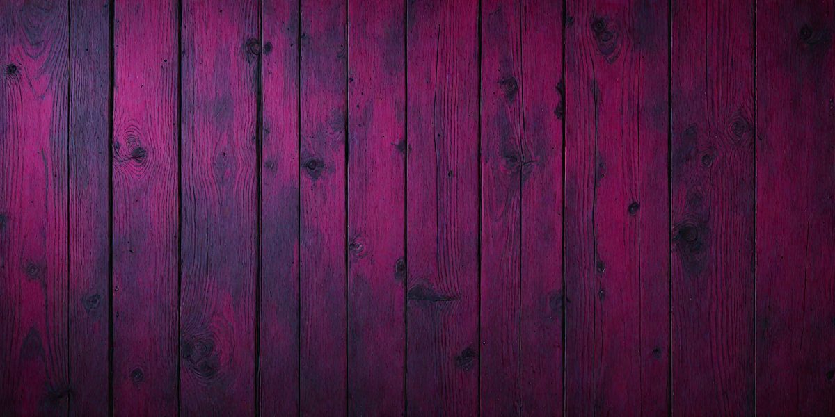 The primary subject of the image is a wooden wall with a purple stain. The setting is a room with a wooden floor. The visual style is a close-up of the wooden wall, showcasing the grain and texture of the wood. The dominant colors are purple and brown, creating a warm and inviting atmosphere.