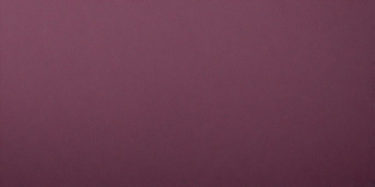 The primary subject of the image is a large, purple wall. The setting is a room with a purple background, and the visual style is a close-up of the wall. The colors and mood of the image are predominantly purple, creating a calm and serene atmosphere.