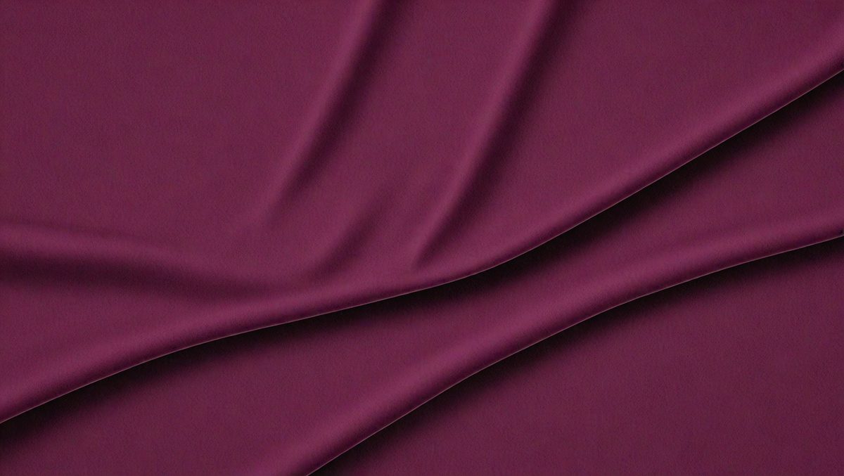 The primary subject of the image is a purple fabric, which is the main object, scene, or focus of the image. The setting or background is a purple cloth, and the visual style is a close-up of the purple fabric. The colors and mood of the image are predominantly purple, creating a calm and soothing atmosphere.