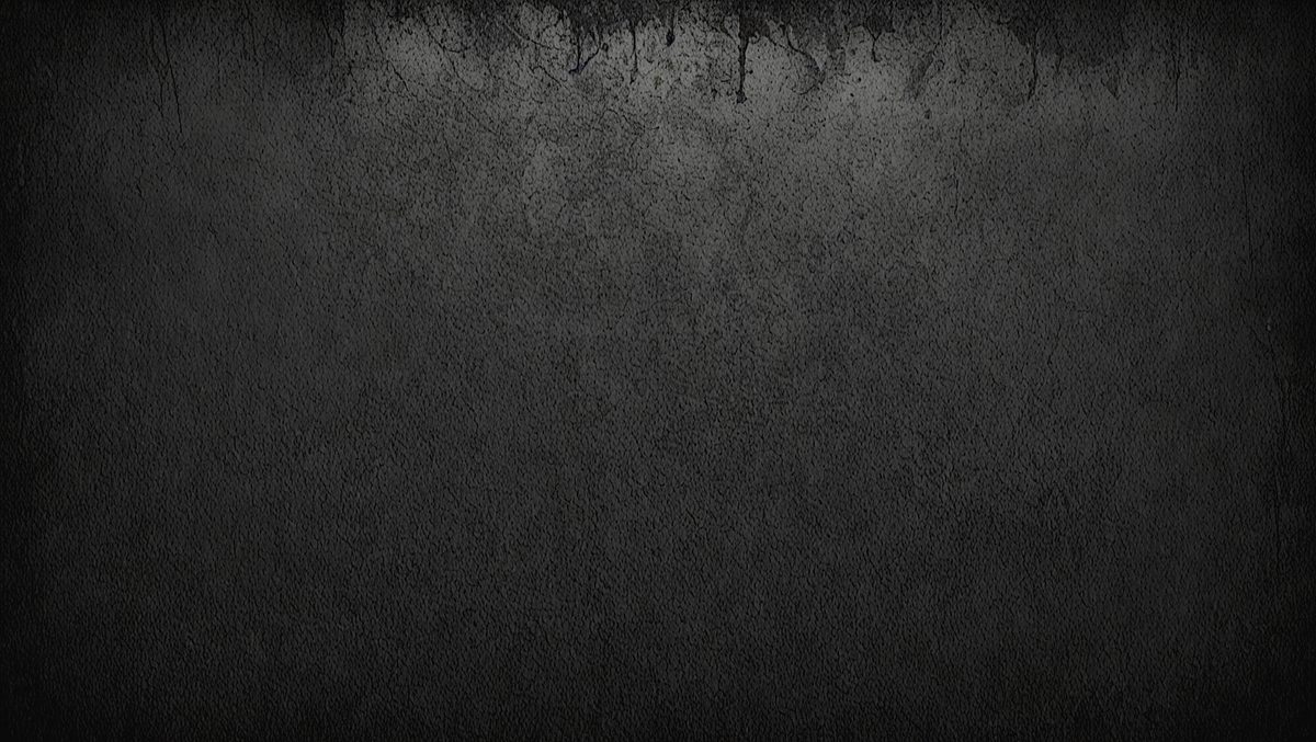 The primary subject of the image is a black and white photo of a wall. The setting is a dark room, and the visual style is a close-up of the wall. The colors and mood of the image are predominantly dark and moody, with the black and white color scheme adding to the atmosphere.