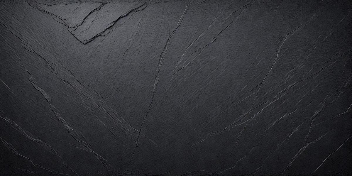 The primary subject of the image is a black leather surface, which appears to be a leather-like material or a leather-textured wall. The setting is a dark room, and the visual style is a close-up of the leather surface. The colors and mood of the image are predominantly dark, with the black leather surface being the main focus.