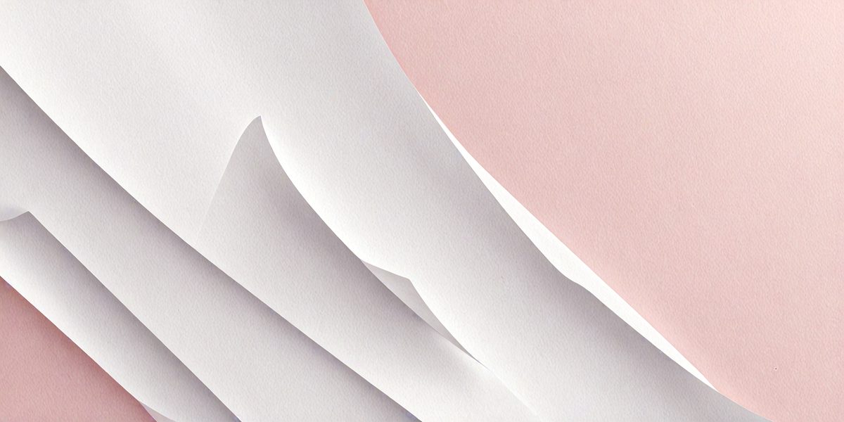 The primary subject of the image is a stack of white paper. The setting is a pink background, which adds a contrasting color to the scene. The visual style is a close-up of the paper, showcasing its texture and details. The colors and mood of the image are predominantly white and pink, creating a clean and elegant atmosphere.
