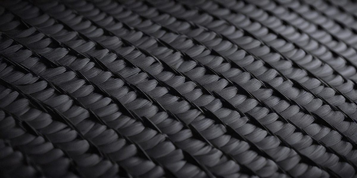 0f745784-4f30-4aaa-bb26-95d1c8f5b4be-freepik__carbon-fiber-texture-black-backgrounds-architectur__88870_250525071841_00001.png