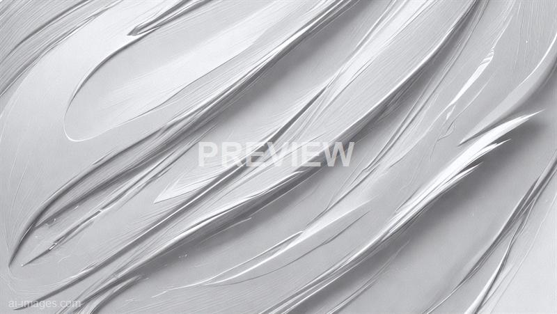 The image displays a close-up view of a surface with smooth, flowing, and slightly textured silver or metallic paint strokes. The strokes are layered and curved, creating a sense of movement and depth with highlights and shadows that emphasize the metallic sheen. The overall appearance is sleek and modern, with a subtle reflective quality.