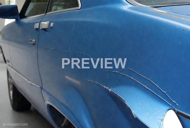 freepik__long-scratch-on-blue-car-paint__57366_250525094922_00001