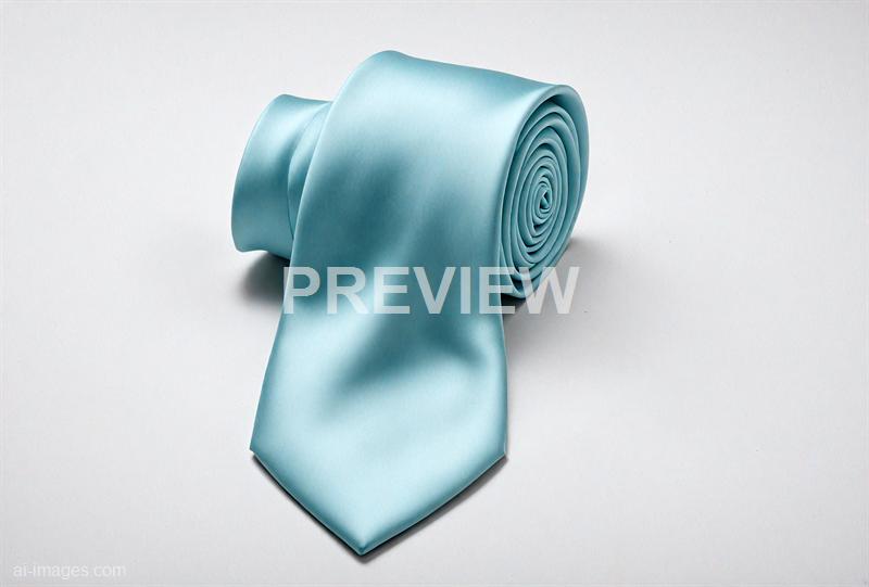 freepik__a-rolled-silk-cyan-tie-on-clean-white__14298_250928180206_00001