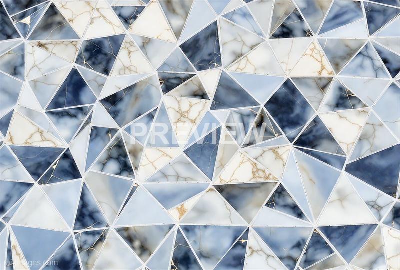 The image features an intricate geometric pattern composed of numerous small, triangular marble tiles arranged in a tessellated design. The tiles display a mix of white, gray, and dark hues with natural veining, creating a visually complex and textured surface. The pattern appears to be part of a decorative surface, possibly a tabletop or wall.