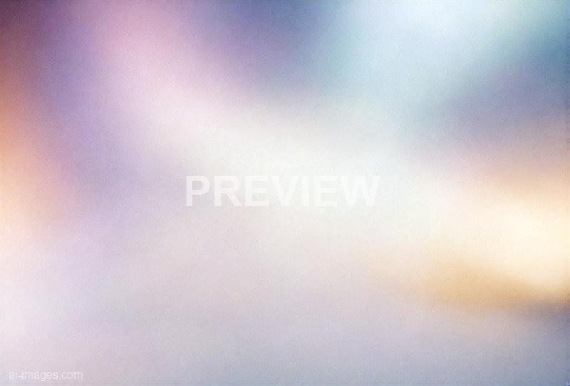 The image appears to be an abstract or highly blurred scene with soft pastel shades blending into each other. There are no clear objects or details visible, giving it a smooth, gradient-like appearance that emphasizes color over form. The overall effect is calming and dreamlike, with a mixture of light pink, purple, blue, and beige tones.